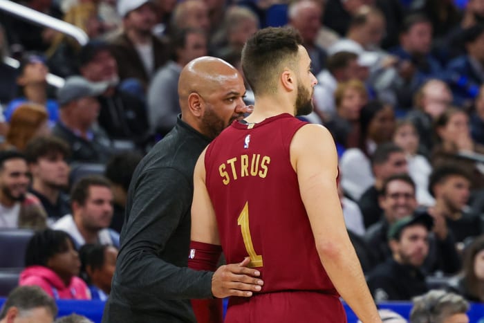 Dec 11, 2023; Orlando, Florida, USA; Cleveland Cavaliers head coach J.B. Bickerstaff talks to guard Max Strus (1) during the second half against the Orlando Magic at Amway Center. Mandatory Credit: Mike Watters-USA TODAY Sports